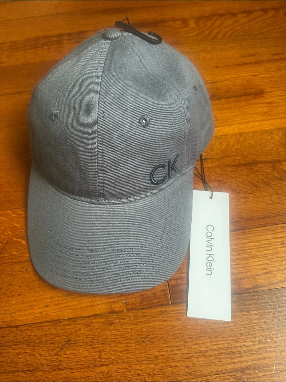 Calvin Klein women baseball cap grey With Blue accents inside logo